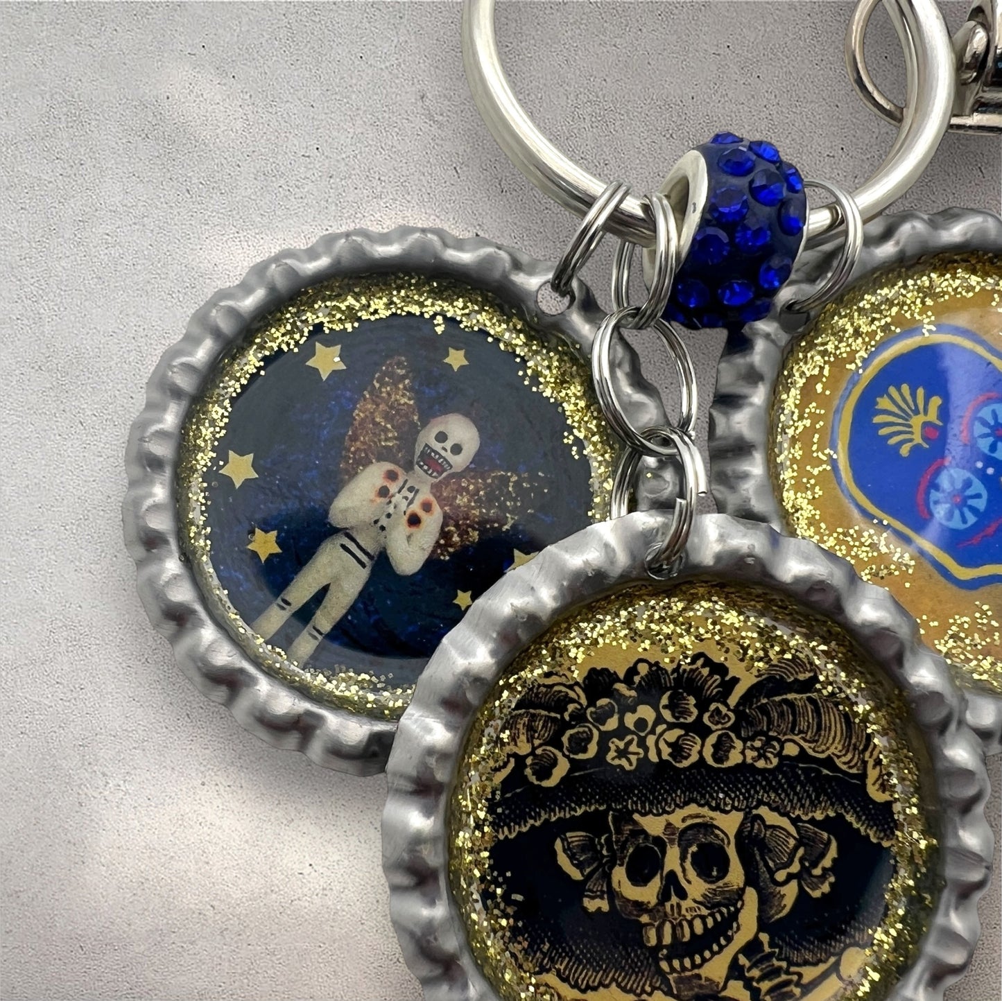 Day of the Dead Bottle Cap Keychain – Resin Calavera, La Catrina & Skeleton Angel