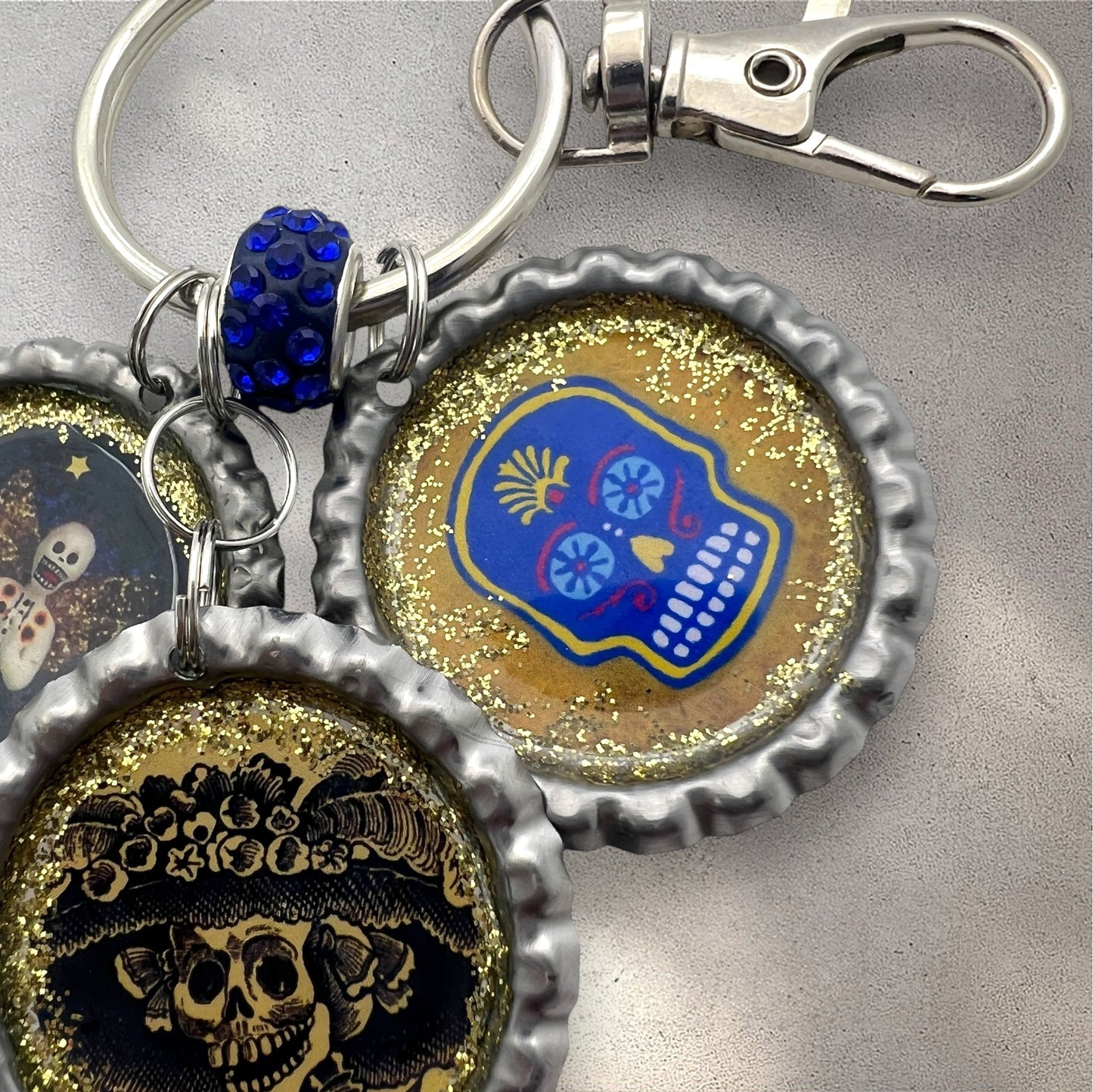 Day of the Dead Bottle Cap Keychain – Resin Calavera, La Catrina & Skeleton Angel