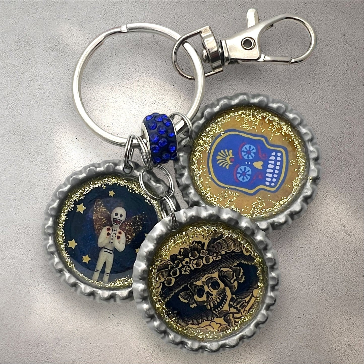 Day of the Dead Bottle Cap Keychain – Resin Calavera, La Catrina & Skeleton Angel