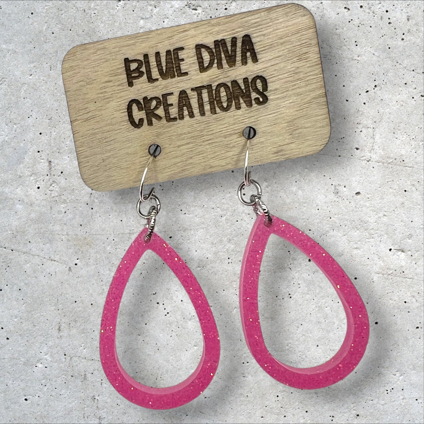 Light pink glitter open teardrop dangle resin earrings