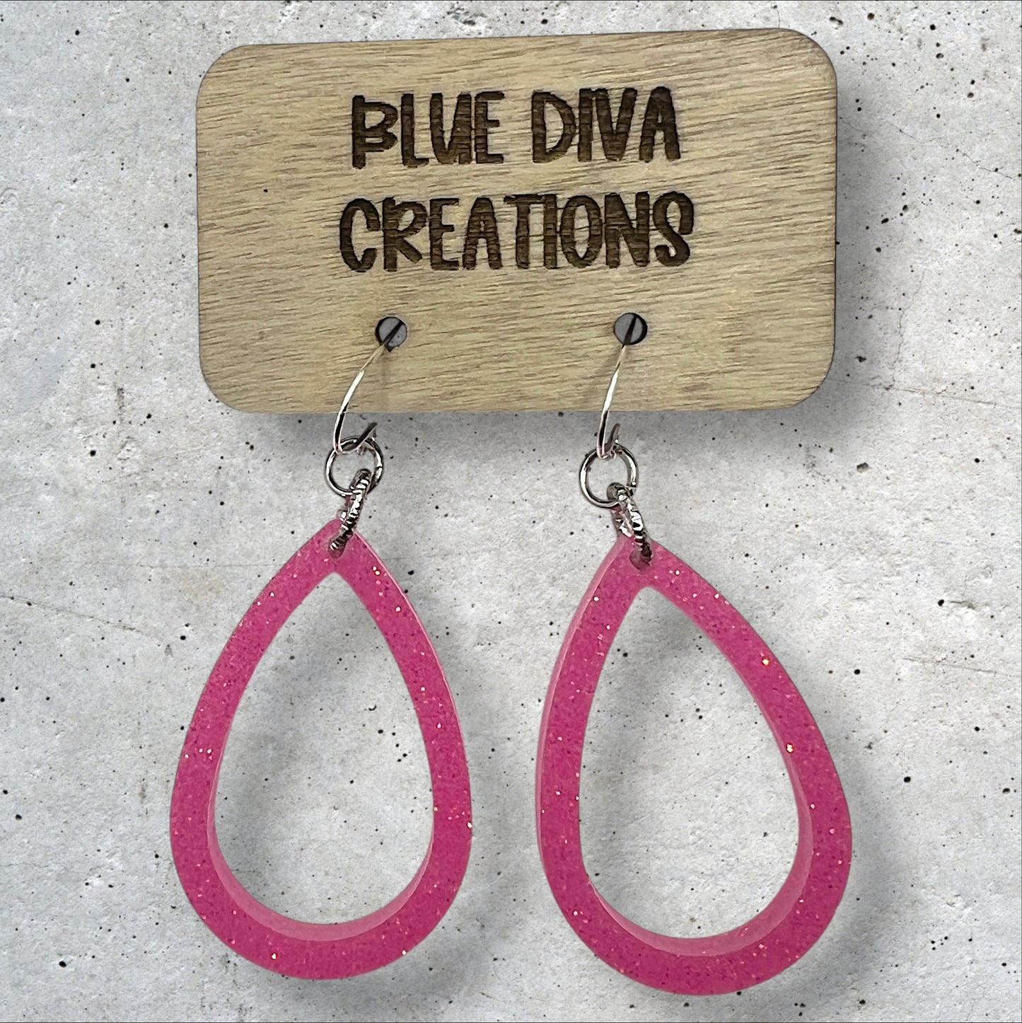 Light pink glitter open teardrop dangle resin earrings