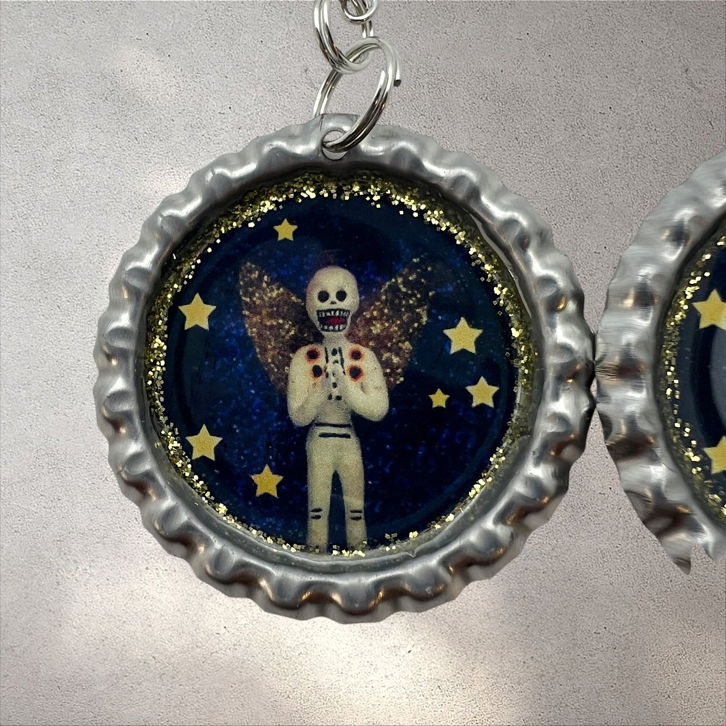 Skeleton Angel Starry Night Bottle Cap Earrings – Día de los Muertos Celestial Jewelry