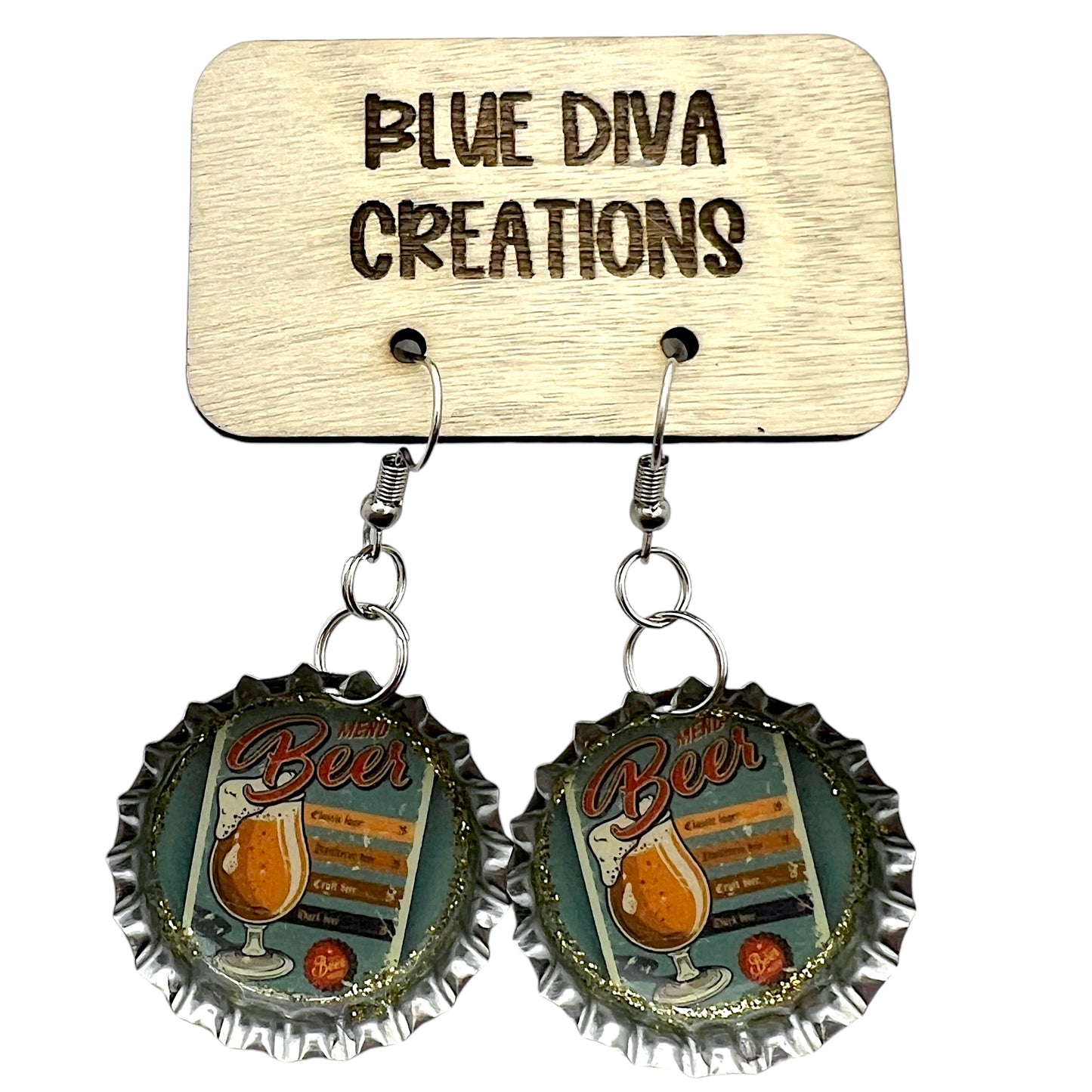 Beer themed bottle cap earrings in the colors of gold and green featuring a glass with beer pouring out