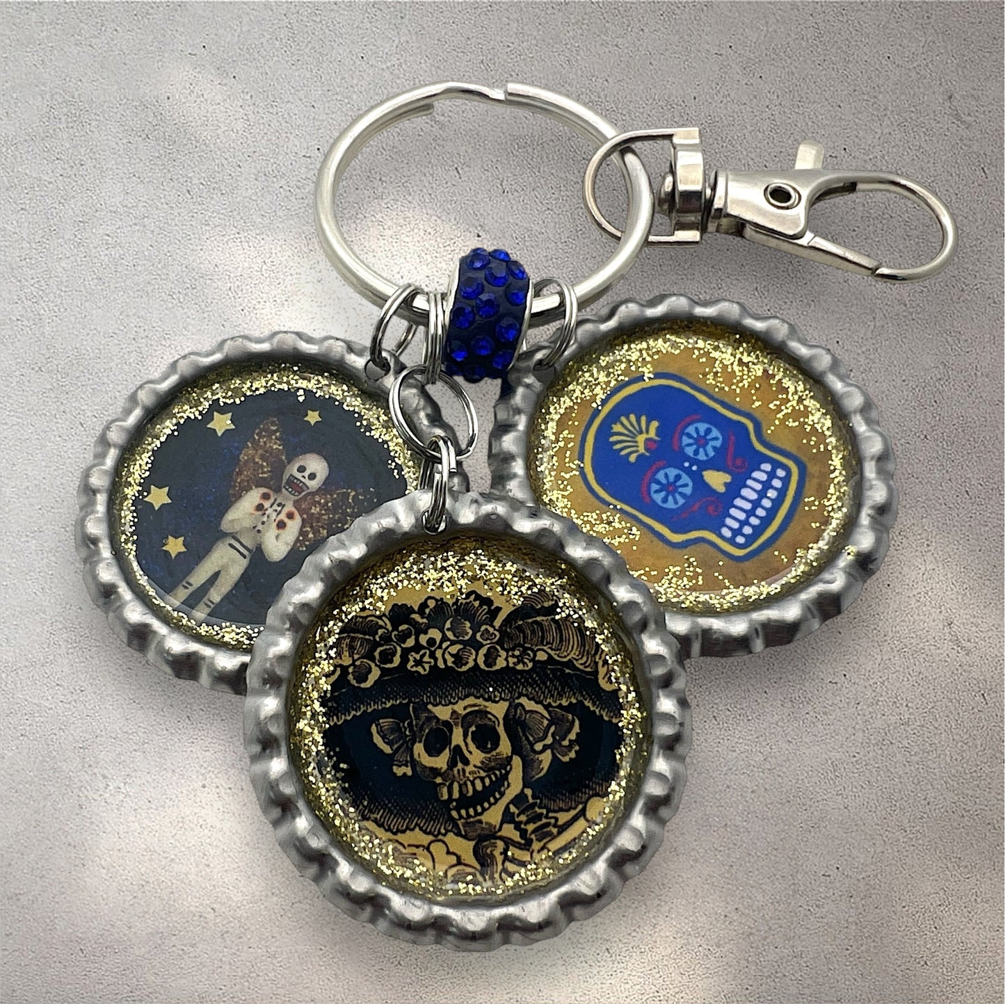 Day of the Dead Bottle Cap Keychain – Resin Calavera, La Catrina & Skeleton Angel
