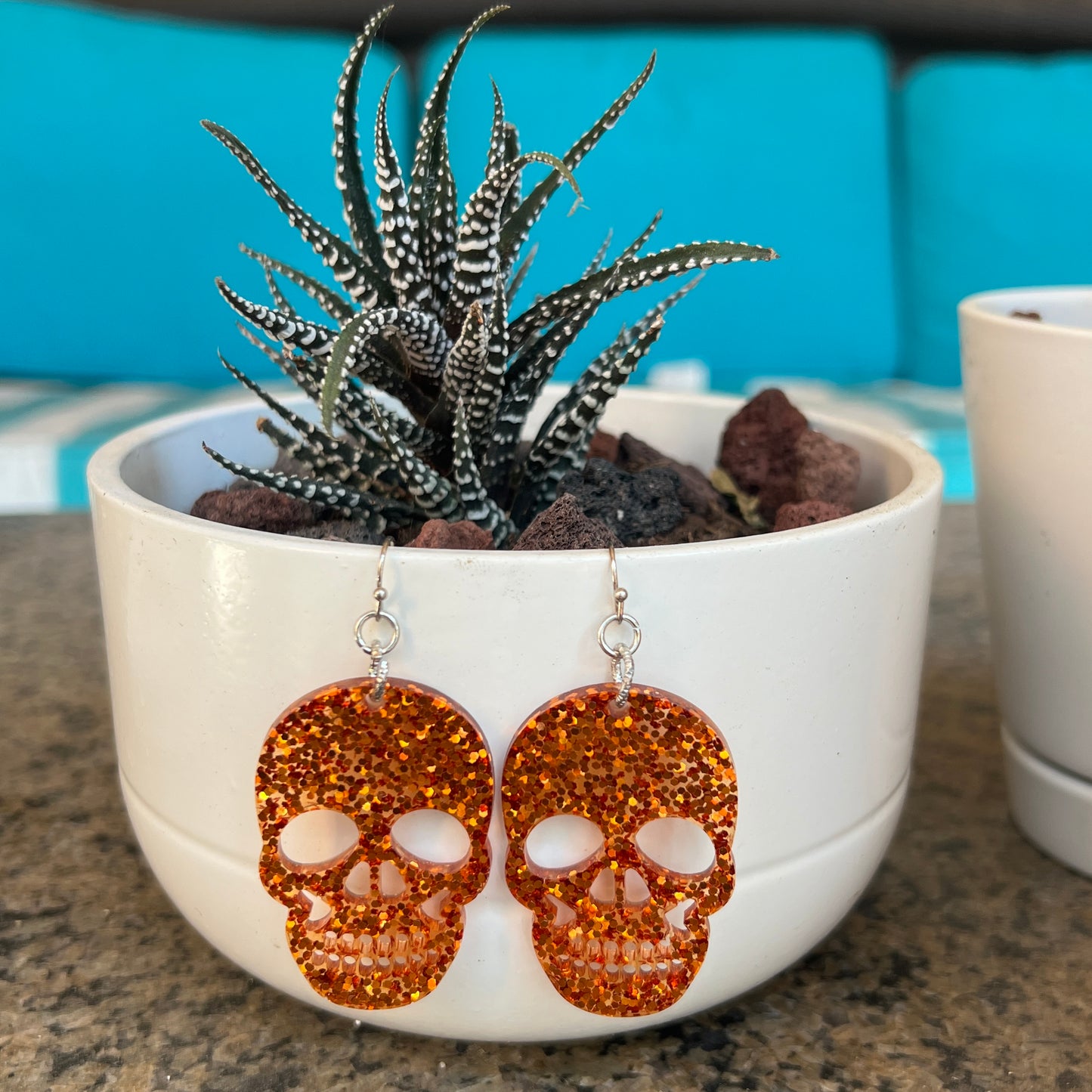 Large Orange Glitter Resin Skull Earrings