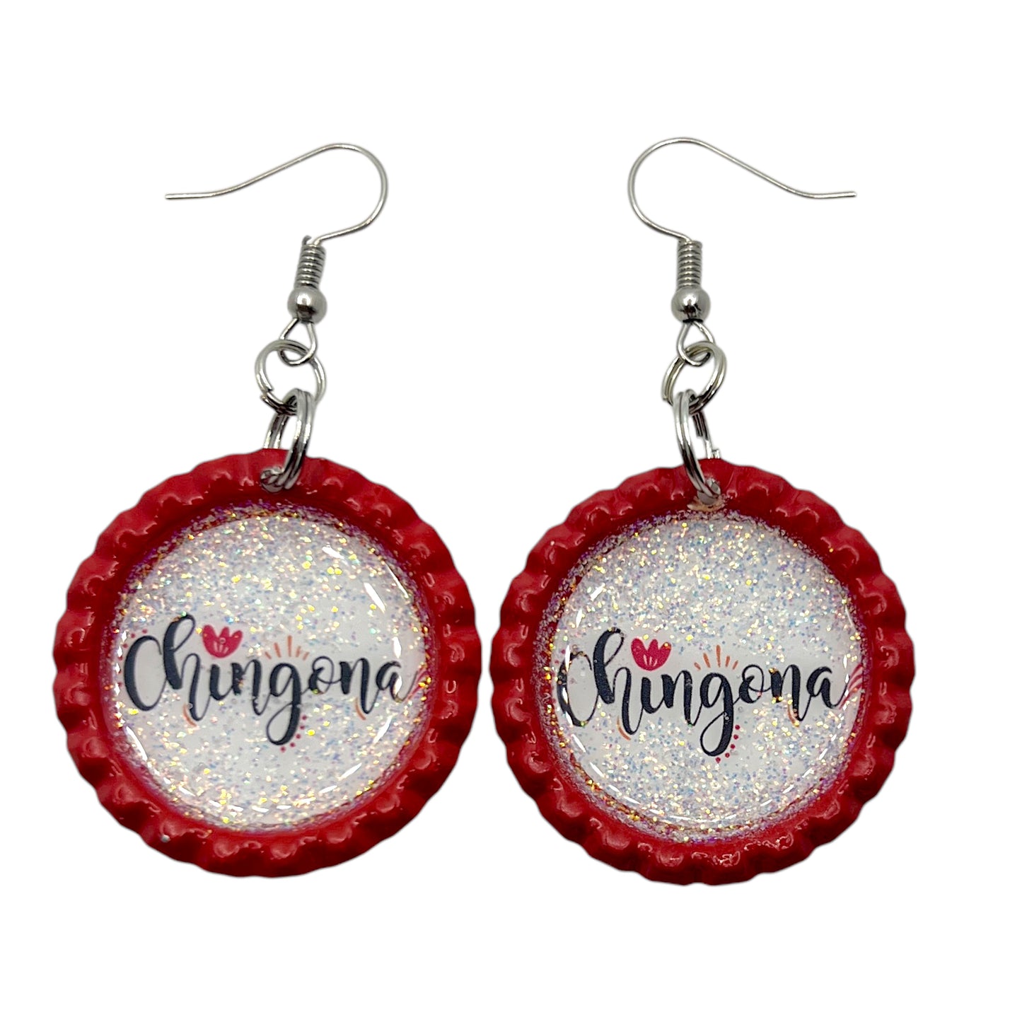 Red flattened bottle cap earrings with script font that says chingona surrounded by iridescent glitter