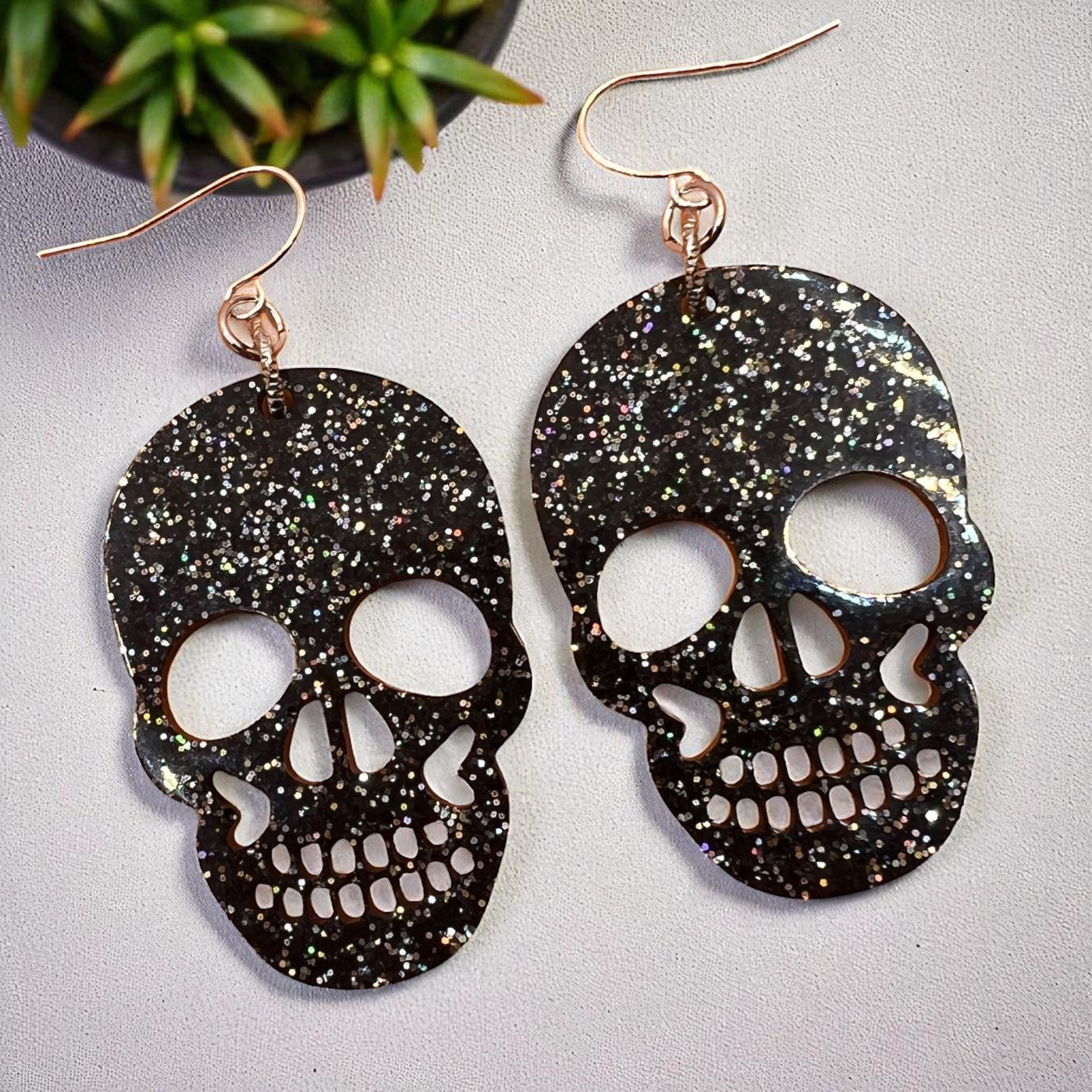Black Resin Glitter Skull 2” Earrings