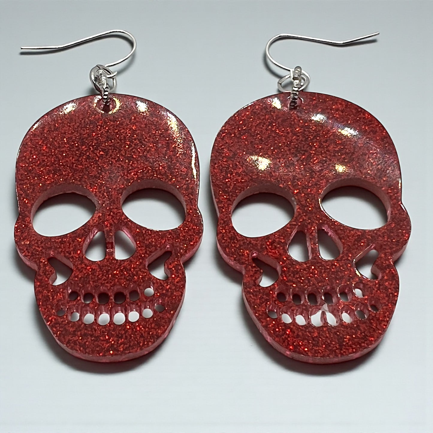 Red Resin Glitter Skull 2” Earrings