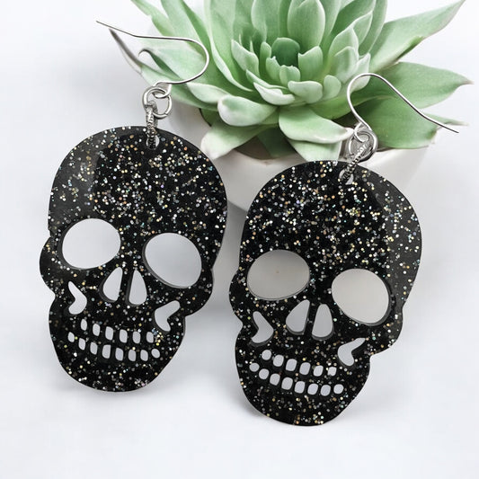 Black Resin Glitter Skull 2” Earrings