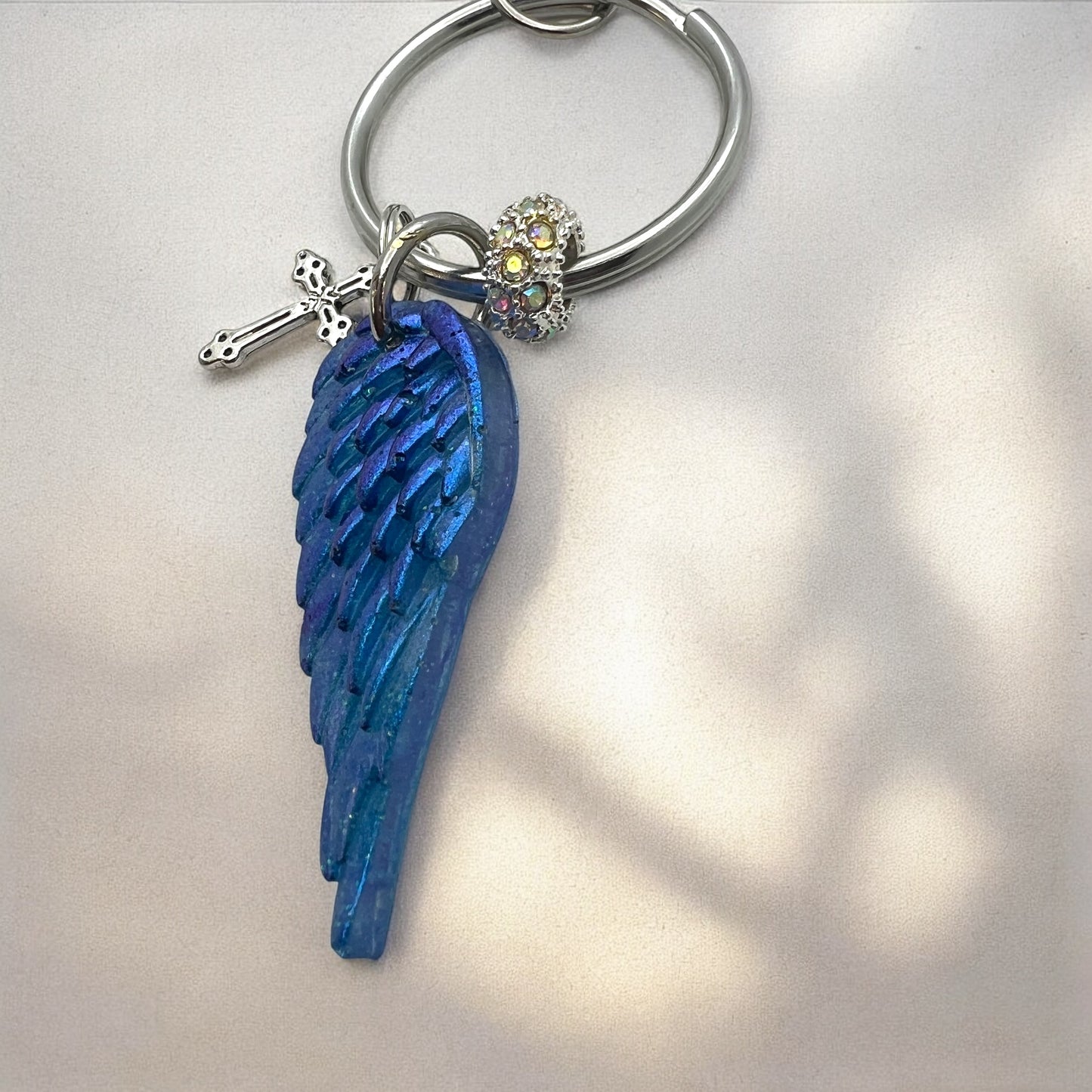Blue Resin Angel Wing Keychain with Cross Charm and Rhinestone Bead