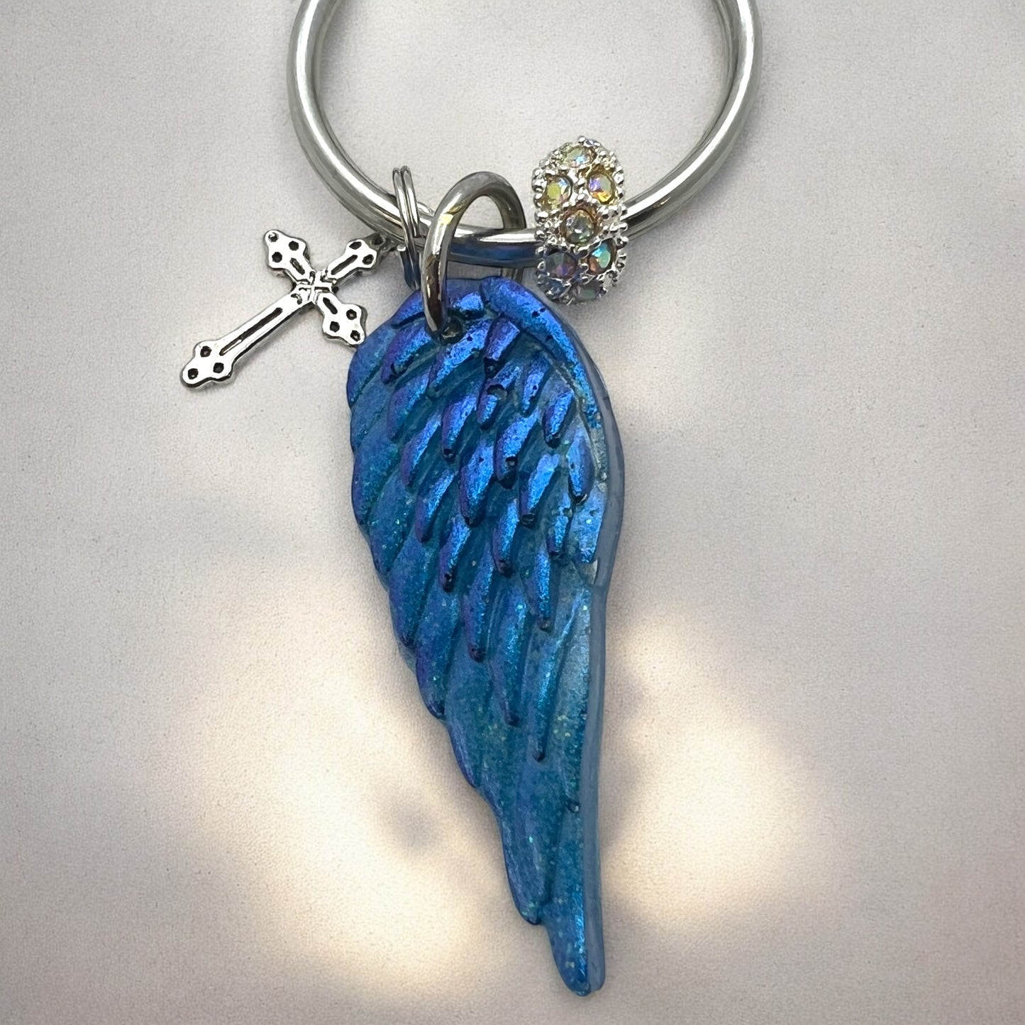 Blue Resin Angel Wing Keychain with Cross Charm and Rhinestone Bead