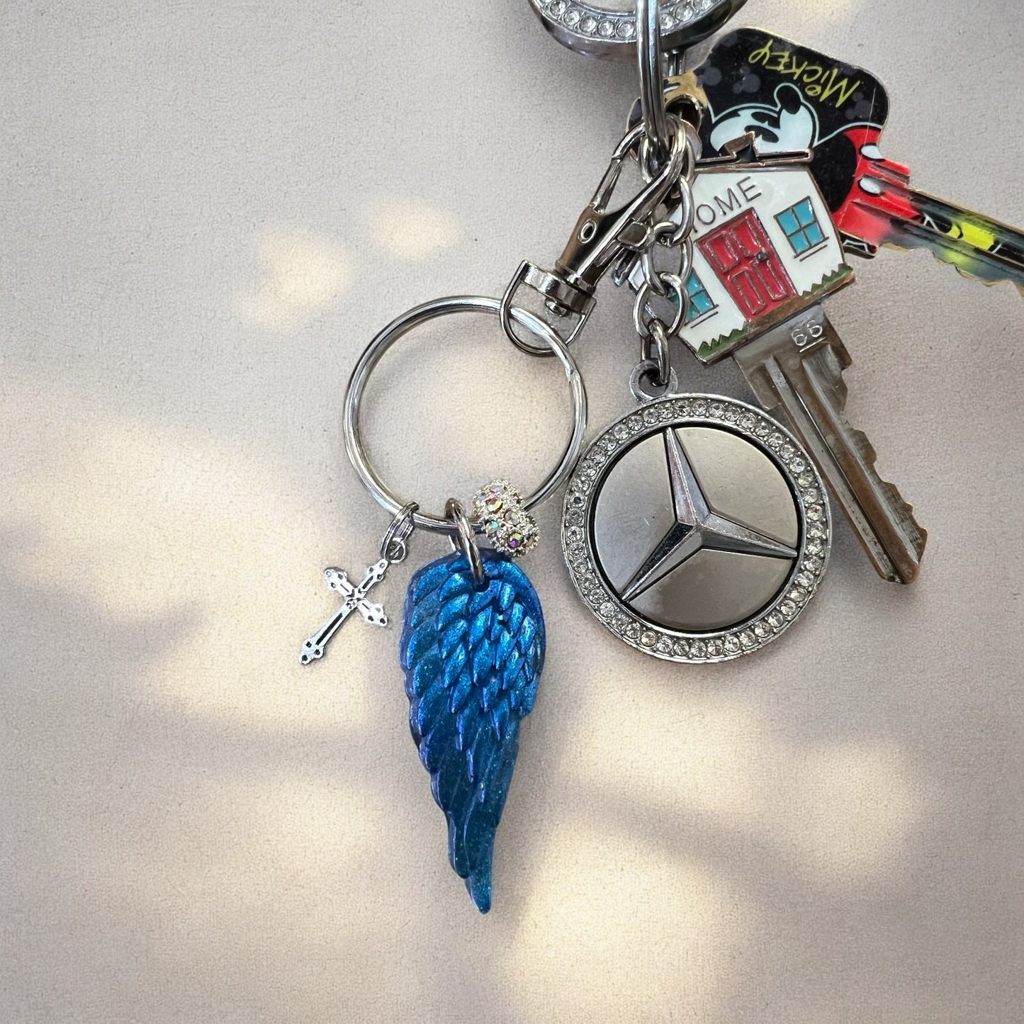 Blue Resin Angel Wing Keychain with Cross Charm and Rhinestone Bead